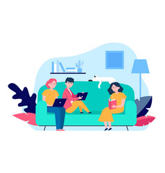 Young People Sitting On Sofa With Laptop Or Book