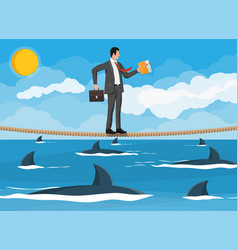 Businessman Walking A Tightrope Over Shark In Sea