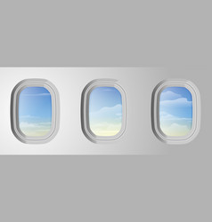 Airplane Windows With Cloudy Blue Sky Outside