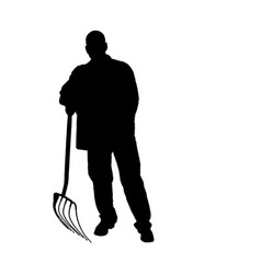 Silhouette Of A Worker With A Snow Shovel