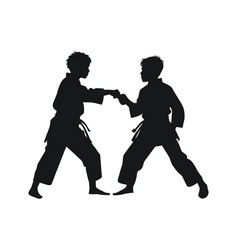 Two Young Boys Doing Karate Silhouette