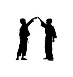 Two Young Boys Doing Karate Silhouette