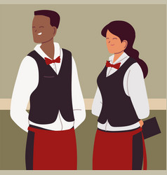 Male And Female Waiters In Restaurant