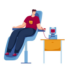 Man Donating Blood Sitting In Chair Connected