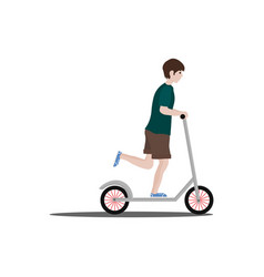 Boy Is Riding A Scooter