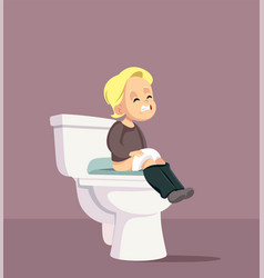 Constipated Little Toddler Sitting On A Toilet