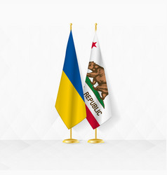 Ukraine And California Flags On Flag Stand For