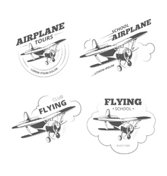 Vintage biplane and monoplane emblems set Vector Image