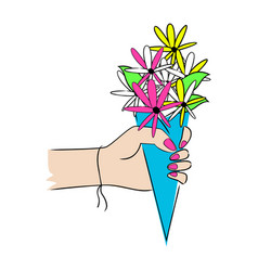 Female Hand Holding A Bouquet Of Flowers