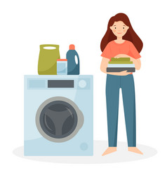 Happy Woman Stands In The Laundry Room With Clean