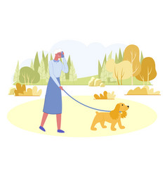 Active Senior Woman Walking With Dog In City Park