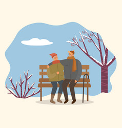 Couple Sitting On Bench In Winter Time