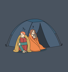 Man And Woman Living In Tent On Street