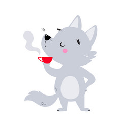 Cute Little Wolf Cub With Grey Coat Drinking Hot