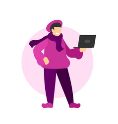 Woman In Winter Clothes With Laptop