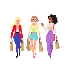 Happy Young Women Going With Shopping Bags