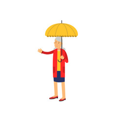 Senior Woman Standing Under Yellow Umbrella