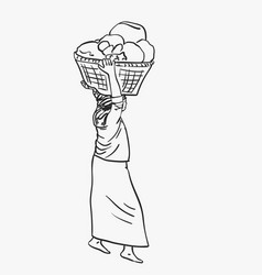 Burmese Woman In Longyi Is Carrying Big Basket