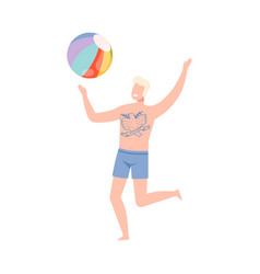 Tattooed Young Man In Swimming Trunks Playing Ball