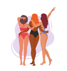 Three Female Friends In Swimsuits Standing