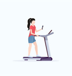 Woman Running On Treadmill Girl Using Smartphone