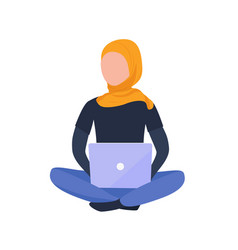 Muslim Girl In Hijab Working With Laptop Sitting