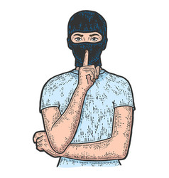 Woman In Balaclava Shows Silence With His Finger