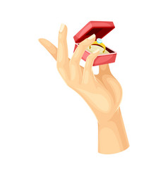 Male Hand Holding Opened Red Box With Golden Ring