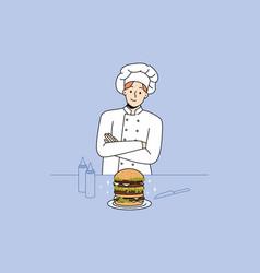 Chef Cook Burger In Restaurant