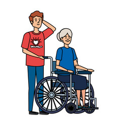 Young Man Volunteer With Old Woman In Wheelchair