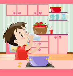 Little Boy Drinking Water In Kitchen