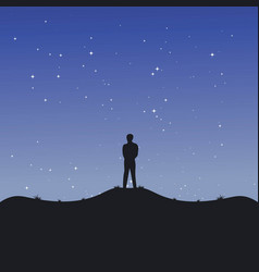 Man Standing Alone On Hill At Night Background