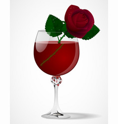 Wine Glass With A Red Rose Isolated On White