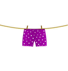 Boxer Shorts With White Hearts Hanging On Rope