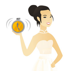 Young Asian Fiancee Holding An Alarm Clock