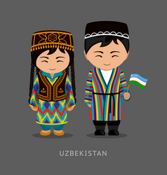 Malaysians in national dress with a flag Vector Image