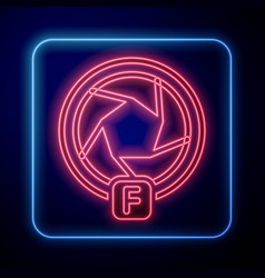 Glowing Neon Camera Shutter Icon Isolated On Black