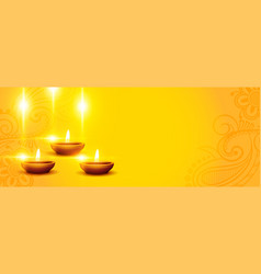 Happy Diwali Banner With Glowing Diya And Text