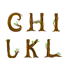 Forest Alphabet Arranged From Tree Trunk