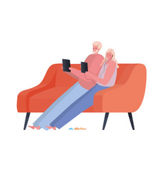 Man And Woman With Tablet On Couch Working