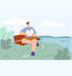 Man Reading On Lake Shore Young Male Rest On