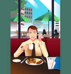 Businessman On The Phone While Having Breakfast