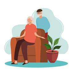 Elderly Old Couple Seated In Livingroom