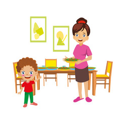 Mother And Child Preparing Dinner Table For Dinner