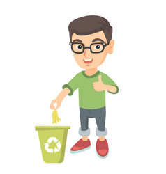 Little Boy Throwing Banana Peel In Recycling Bin