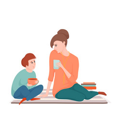 Mother And Son Drinking Tea And Talking