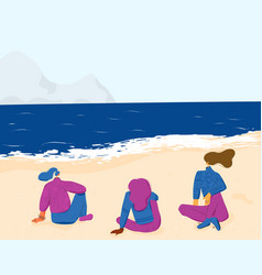 Three Young Women Sitting On Beach Adult