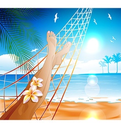 Woman Lying In A Hammock On The Beach