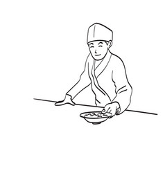 Male Japanese Chef Serving A Dish Of Food