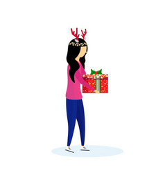 Asian Woman Wearing Deer Horns Holding Gift Box